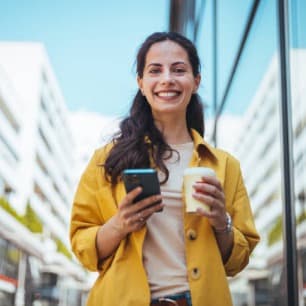 Woman checking her Phi Longevity health score on her phone